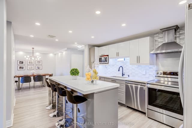 Condo Apartment at 65 Huntingdale Boulevard 103, Toronto, ON M1W 2P1, Toronto E05