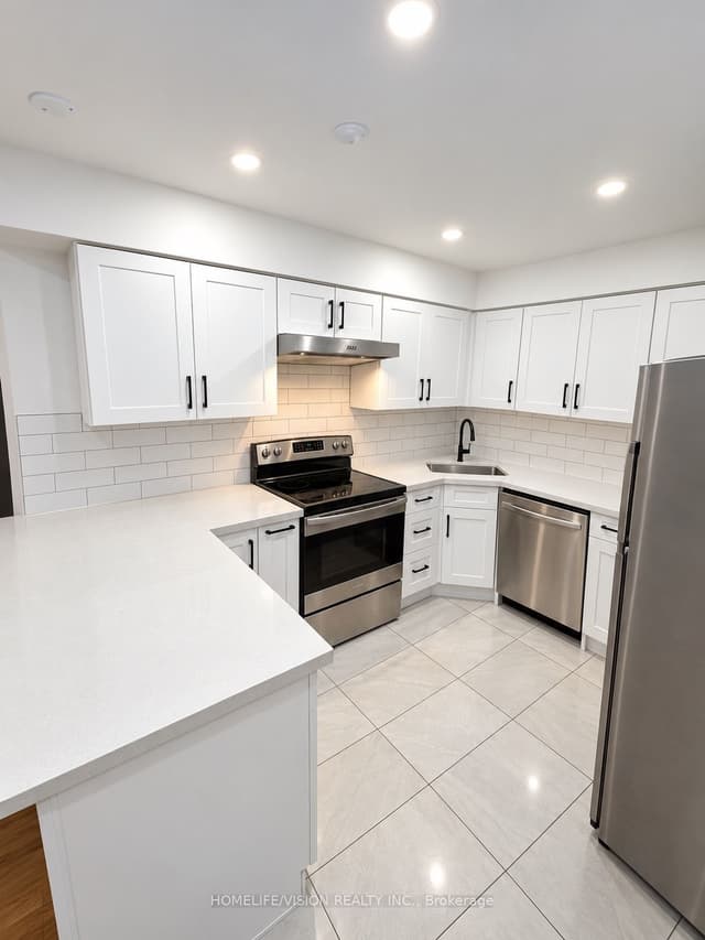 Store W Apt/Office at 473 Cosburn Avenue APT. A, Toronto, ON M4J 2N6, Toronto E03
