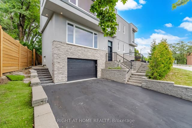Duplex at 107 Trethewey Drive, Toronto, ON M6M 4B6, Toronto W04