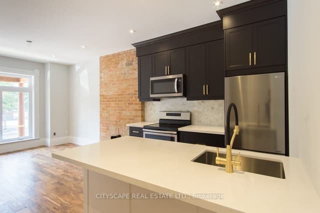 Att/Row/Townhouse at 936 Dundas Street E Main, Toronto, ON M4M 1R3, Toronto E01