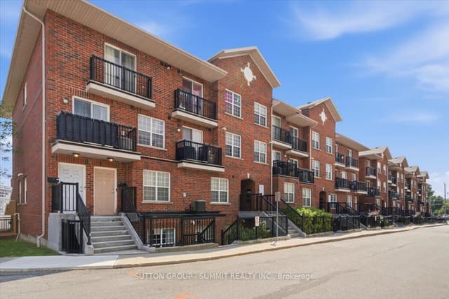 Condo Townhouse at 25 Strangford Lane 201, Toronto, ON M1L 0E5, Toronto E04