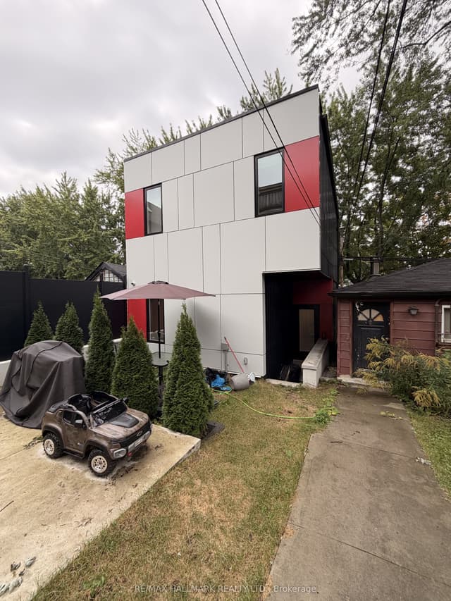 Duplex at 31 Woodfield Road Laneway, Toronto, ON M4L 2W4, Toronto E01