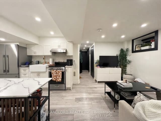 Fourplex at 121 Sorauren Avenue 4, Toronto, ON M6R 2E3, Toronto W01
