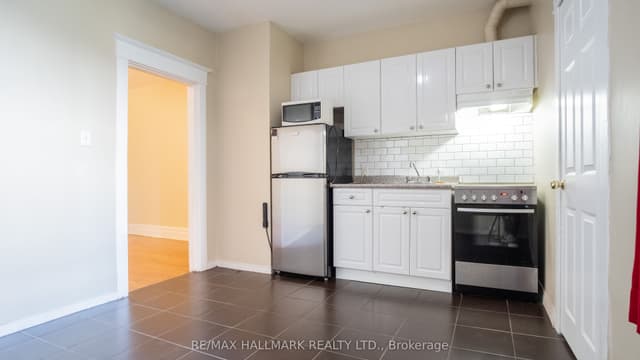 Fourplex at 560 Jones Avenue 3, Toronto, ON M4J 3H1, Toronto E01