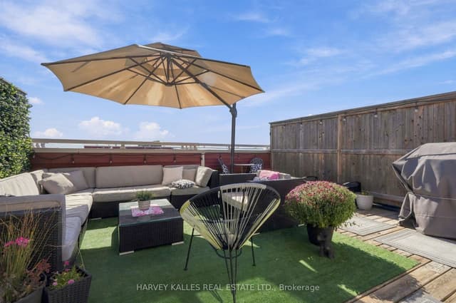 Condo Townhouse at 145 Long Branch Avenue 22, Toronto, ON M8W 0A9, Toronto W06