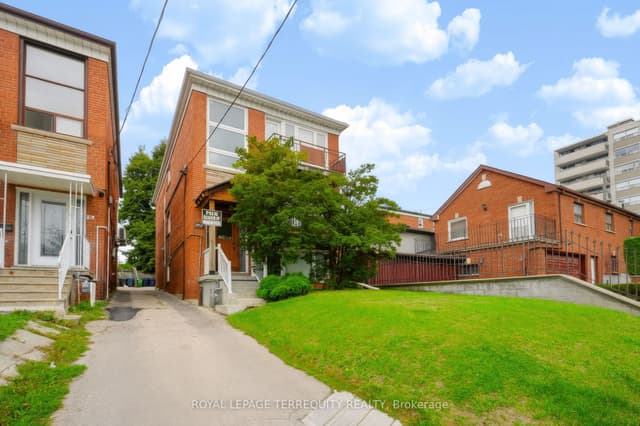 Triplex at 32 Dynevor Road Upper, Toronto, ON M6E 3X1, Toronto W03