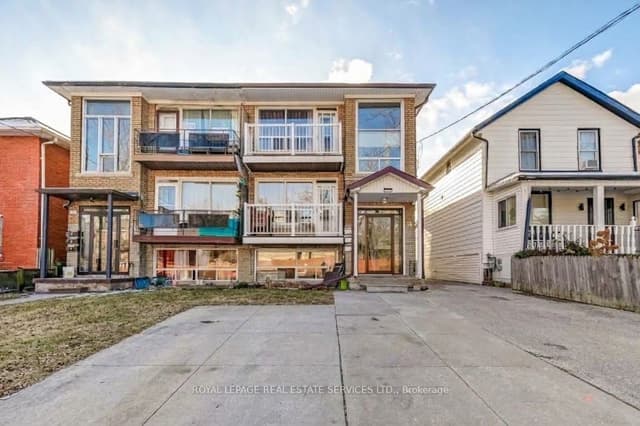 Triplex at 74 Burlington Street 1, Toronto, ON M8V 2L2, Toronto W06
