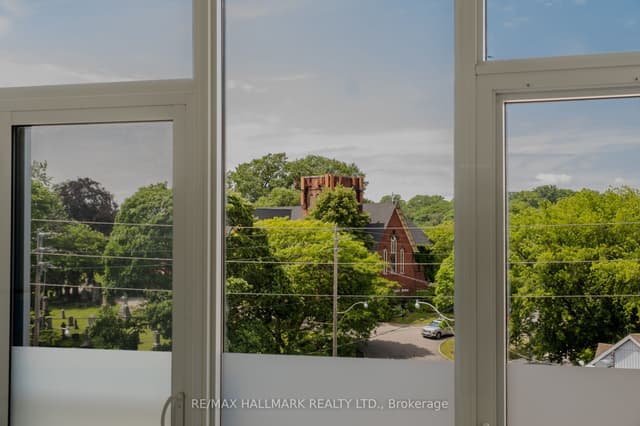 Condo Apartment at 60 Haslett Avenue 404, Toronto, ON M4L 0A9, Toronto E02