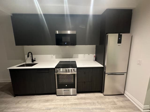 Condo Apartment at 2369 Danforth Avenue 209, Toronto, ON M4C 0B1, Toronto E02